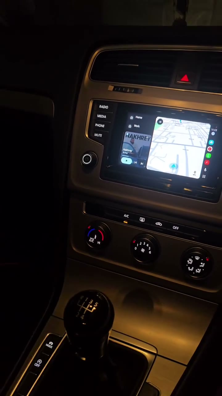 CarPlay screen with warm ambient lighting fitted
